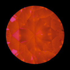 長波紫外線下での強いオレンジ色蛍光