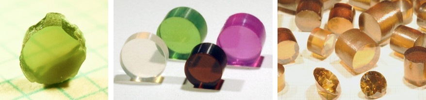 図10. 超高圧合成法により得られたヒスイ（左： Alに対してCrを1モル%置換、直径約2 mm）、様々な組成のナノ多結晶ガーネット（中：直径約4 mm）、ナノ多結晶ダイヤモンド（右：直径約6-8 mm）。
